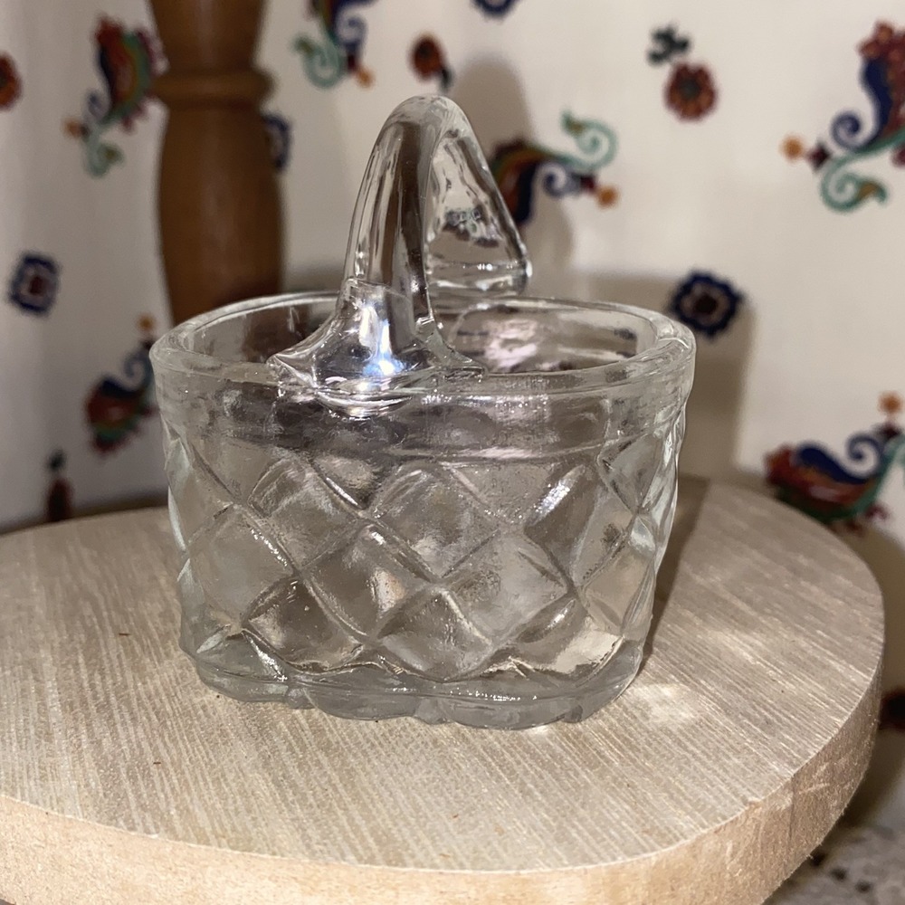 Vintage Quilted Glass Basket Shaped Handled Open Salt Cellar glows light pink